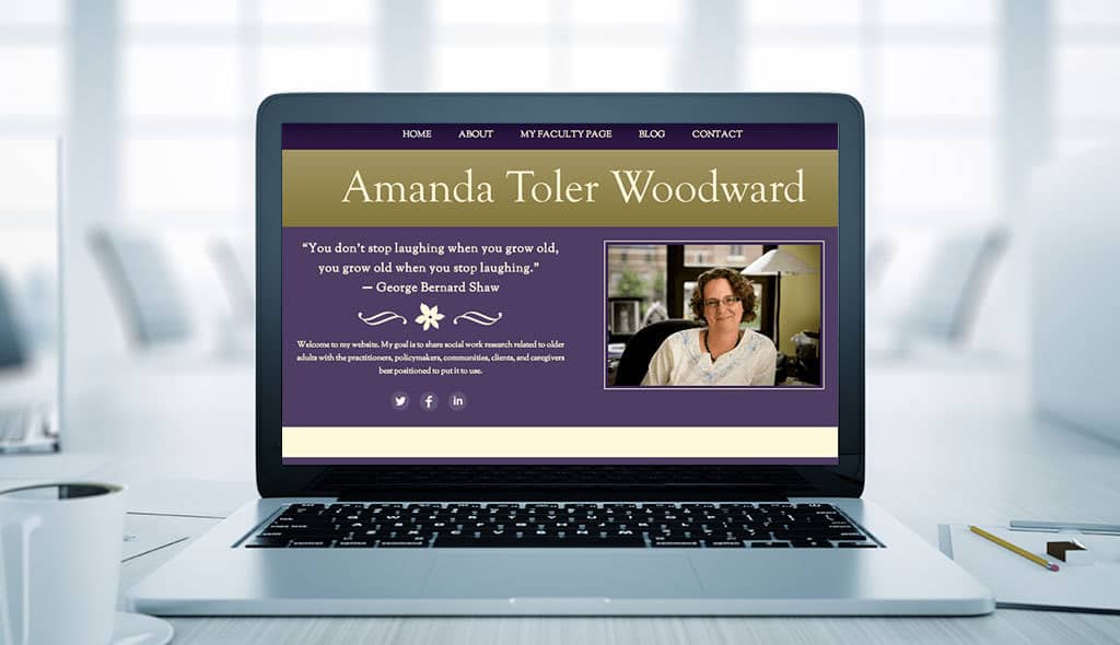 laptop displaying the home page of Amanda Toler Woodward