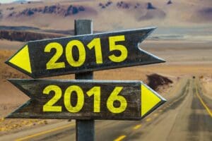 2015 - 2016 signpost in a desert road background