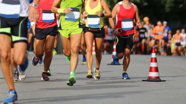 male and female athletes  during the run of the marathon race in the city