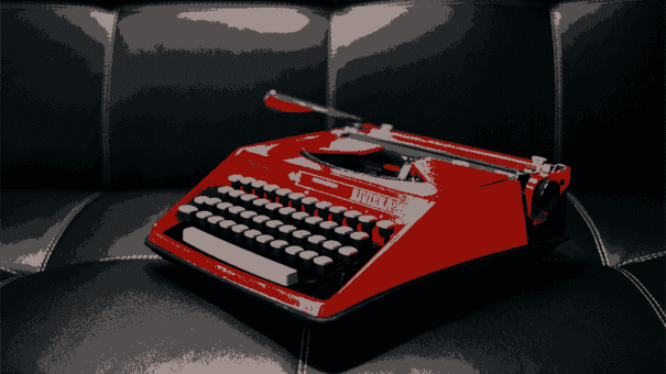 This is a red typewriter.