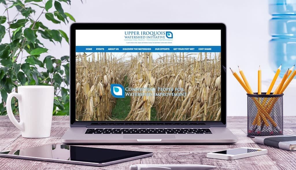 iroquois laptop displaying the home page of Iroquois Watershed