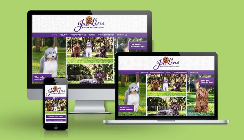 desktop, laptop, & cell phone displaying the homepage of Joalins Labradoodles