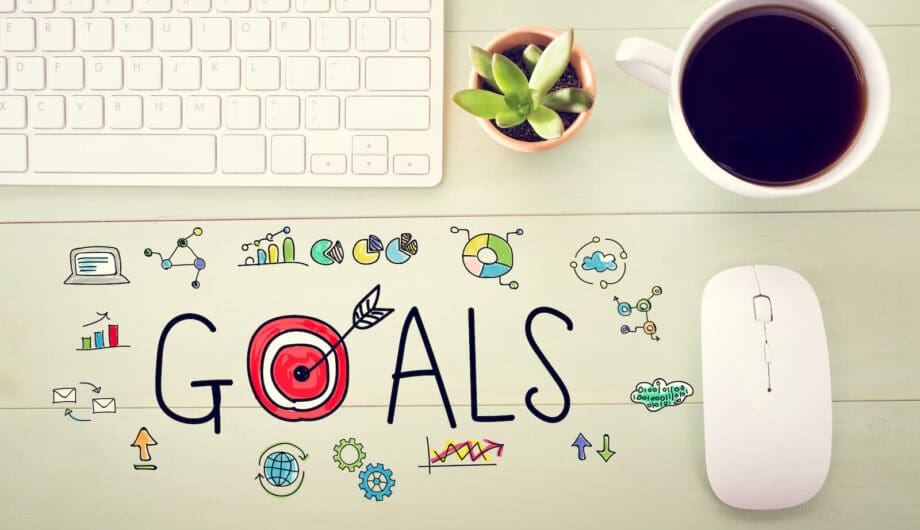 Goals concept with workstation Setting online goals