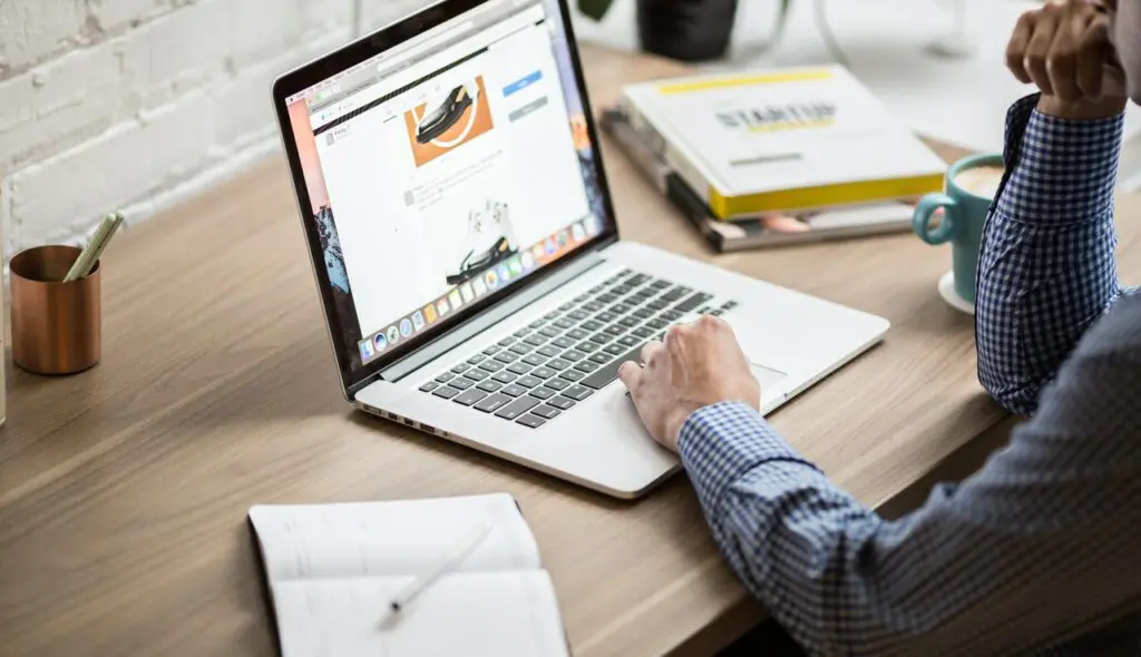 firstwebsite Person using laptop