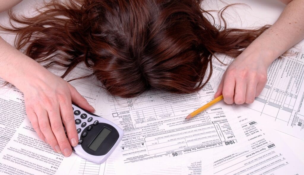 death by taxes Tired person trying to figure out taxes and wondering how set up woocommerce taxes