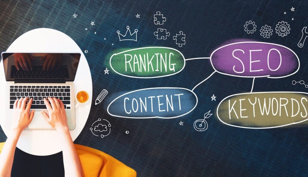 SEO concept with person using a laptop SEO concept with person using a laptop to represent an SEO cheatsheet