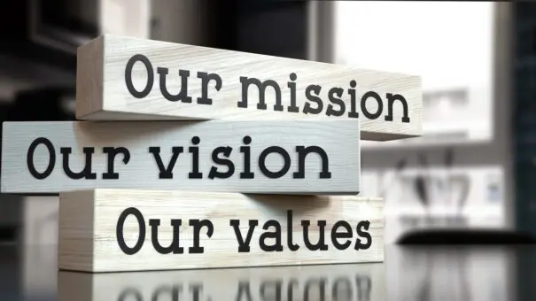 Blocks that read Our Mission, Our Vision, Our Values to represent an about us page