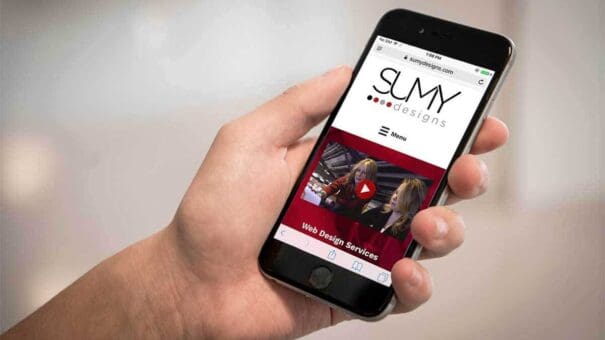 Mobile phone in customers hand showing mobile optimized website.