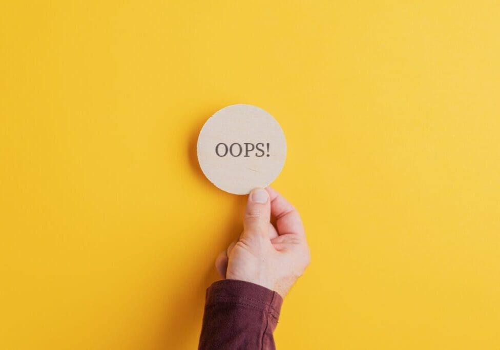 Oops sign on wooden cut circle Oops! The Biggest SEO Mistake business owners make