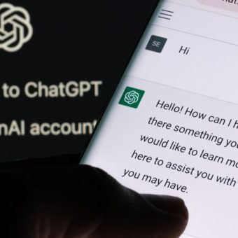 ChatGPT chat bot screen seen on smartphone and laptop display with Chat GPT login screen on the background. A new AI chatbot by OpenAI. Stafford, United Kingdom, December 13, 2022. Using ChatGPT for business