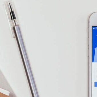 facebookplanner Facebook app and a paper agenda