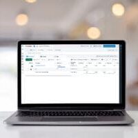Laptop showing ad campaign manager in Facebook