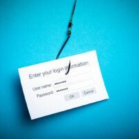 Concept of hacking or phishing a login and password with malware program
