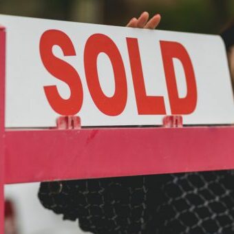 Sold sign after improving real estate website Sold sign after improving real estate website