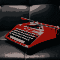 This is a red typewriter.