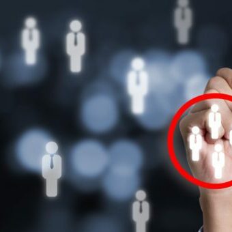 Marketing target audience concept , Businessman writing red circle to mark to focus customer group. Representation of target audience