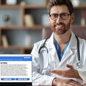 website-for-medical-practice A doctor showing his website for medical practice